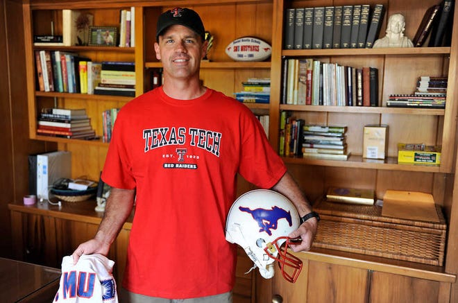 Despite having played defensive back and receiver for SMU from 1988 to 1991 Daniel Echols says his loyalties now lie with his wife's alma matter, Texas Tech. (John A. Bowersmith/Lubbock Avalanche-Journal)