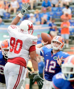 Florida quarterback John Brantley throws a pass during Saturday's win over Miami of Ohio. The Associated Press