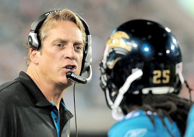 Jaguars coach Jack Del Rio talks to former player Reggie Nelson during a preseason game against Atlanta on Sept. 2. Del Rio and the Jaguars face arguably their most crucial season opener in franchise history Sunday when Denver comes to town. The Associated Press