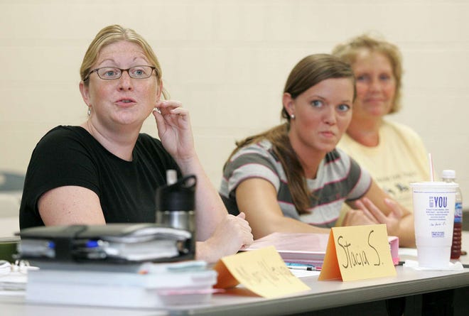 Stacia Sackmaster (left) talks during a nursing theory class at Saint Anthony College of Nursing in Rockford on Monday, Aug. 30, 2010.