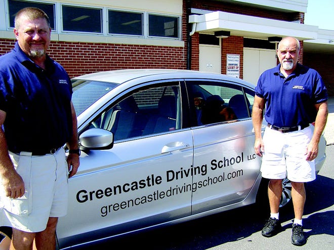 Chuck Tinninis, left, and Delbert Myers opened Greencastle Driving School to fill the void after the school district dropped behind-the-wheel training from the curriculum.