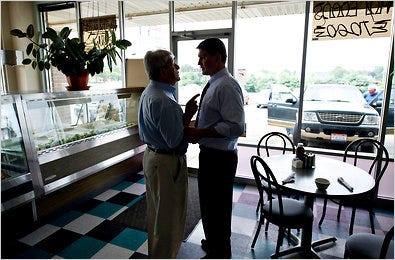 John Corcodel, 87, left, gave Representative John Boccieri an earful on Aug. 11 at Samantha’s Restaurant in North Canton, Ohio.