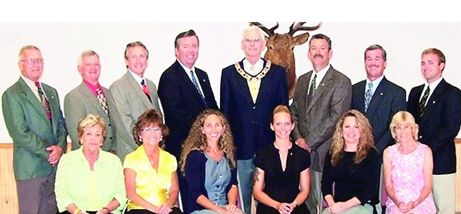 St. Augustine Elks Lodge 829 initiated new members in August. Front row seated left: Suzanne Podlesny, Grace Smithey, Undine Pawlowski, Racqual Gregory, Connie King, and Dorothy Quelch. Back row: Donald Ronn, Douglas Slack, Richard Job, Kevin O'Neill, exalted ruler Fred DuPont, Tom Abbate, John Kelleher and Davis Alexander.