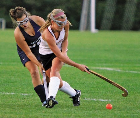 Portsmouth High School’s Eilee Foley (right) gains control of the ball during Tuesday’s Division II field hockey game against Hollis/Brookline.
The Clippers won, 4-1.