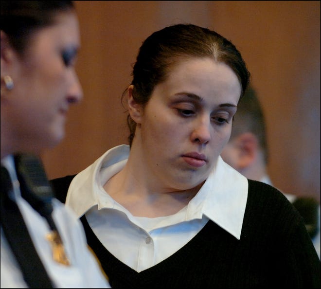 Jessica Deane, right, enters the courtroom after the morning recess, during her murder trial on Jan. 30, 2007, at Suffolk Superior Court in Boston. Deane, 23, is charged with two counts of first-degree murder in the May 23, 2004, deaths of Kayla and Xavier Ravenell.