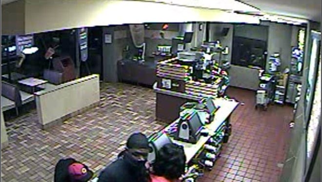 On Monday, September 20, 2010, an armed robbery occurred at the McDonalds located at Okeechobee Blvd and Jog Road, West Palm Beach. • The suspect with the black cap is described as 5’8” - 5’9” with a thin build. • The suspect with the red hat was described as 5’6” - 5’7” with a thin build. Please note the unusual way the suspect is wearing his shoes. If anyone can identify these suspects they are urged to contact Crime Stoppers at 1-800-458-TIPS.