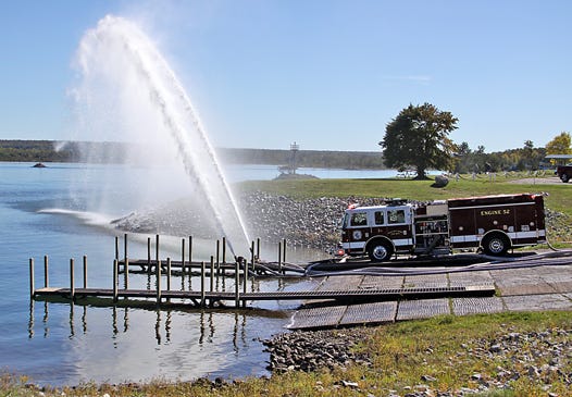 Sault Firefighters tested all three of the firefighting units on Tuesday using the Aune-Osborn Boat Ramp to make sure the pumps were up to fill capacity. The annual test, conducted by an outside company, provided a pretty good show for those staying at the nearby campground.