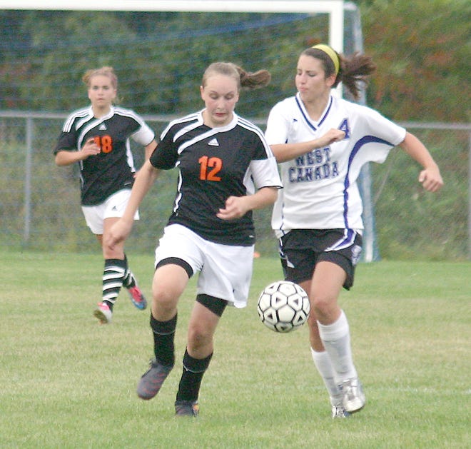 Mohawk's Nicole Landry and West Canada Valley's Sara Smith (from left) pursue the ball in the second half Wednesday.