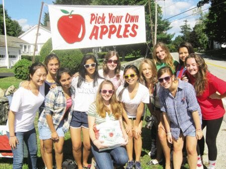 Alison Ladd photo
Students from Wheelwright dorm at Phillips Exeter Academy outside Applecrest Farm on Academy Life Day.