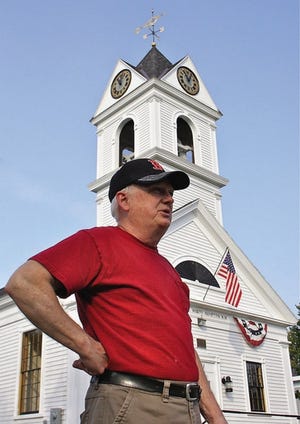 amy kane photo 
George Chauncey outside Town Hall and below his new responsibility, the clock in the steeple.