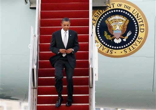 President Barack Obama walks down the stairs from Air Force One upon his arrival at Andrews Air Force Base, Md. on Friday, Sept. 24, 2010.