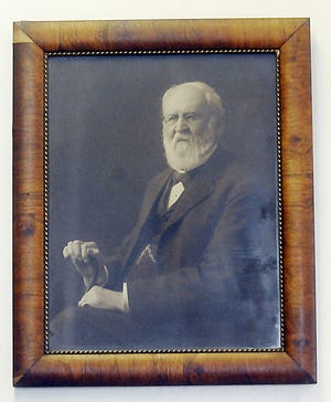 A portrait of company founder Marcus Morton Rhodes hangs in the office of M.M. Rhodes and Sons.
