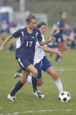 Ken Stejbach photo
Exeter High School’s Erica Estey, left, and Winnacunnet’s Carly Gould battle for control of the ball during Friday’s game between the two rivals in Hampton. Exeter won, 2-1.