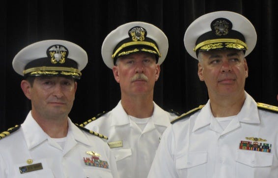 Capt. Peter E. Schupp (left) was relieved by Capt. Ronald E. Cook (center) as Commander, Southeast Regional Maintenance Center. Rear Adm. Joseph Campbell, NAVSEA (SEA 04) (right) was the guest speaker.