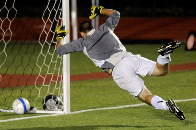 Hickman goalkeeper Chuck Wilson can’t get to the ball before it lands in the net for a Kory McDonald goal in the Kewpies’ 1-0 loss to crosstown rival Rock Bridge yesterday at Hickman’s LeMone Field.