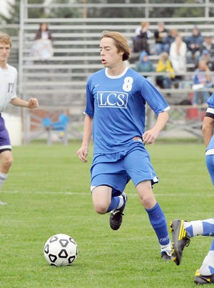 Lenawee Christian junior Caleb Ghena, above, has stepped into a goal-scoring role for the Cougars this season. After scoring five goals last season, Ghena has already netted 12 goals through 14 games, including two hat tricks.