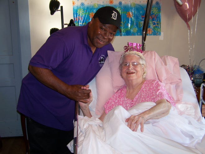 pictured is Clara Baker and Mayor Leroy Sullivan who turned 100 years young Wednesday.