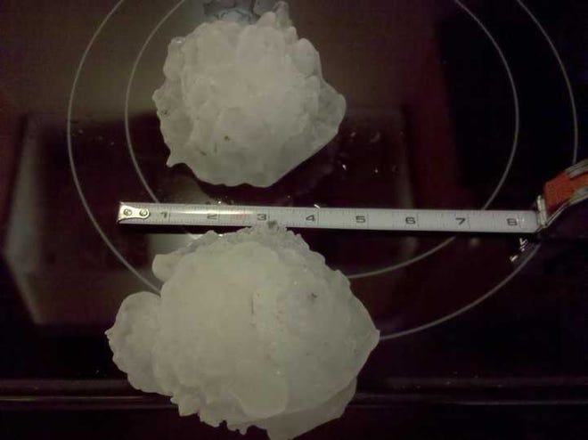 Even the non-record breaking hail, the "smaller pieces that measured 5.5 inches in diameter, did devastating damage to roofs, vehicles, lawns and crops during a Sept. 15 storm over Wichita.