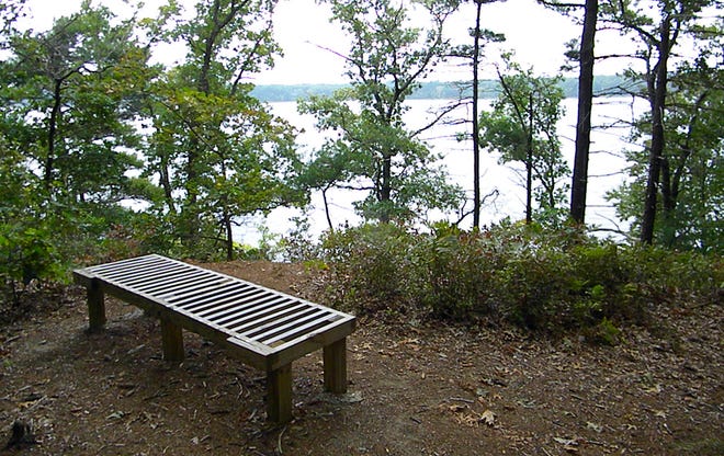 Someone installed a bench overlooking Silver Lake. Conservation Agent Maureen Thomas has no idea who did it, but appreciates the gesture.
