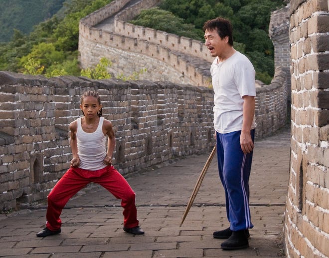 In this publicity image released by Columbia Pictures, Jaden Smith as "Dre", left, and Jackie Chan as Mr. Han, are shown in "The Karate Kid."