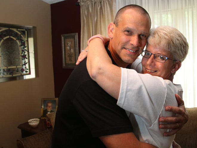 David and Leah Pistarelli give each other a hug at their home in Belleview, Fla. on Friday, Oct. 16, 2009. Leah was diagnosed with breast cancer on Sept. 25, 2008 and had a mastectomy on Oct. 22, 2008.