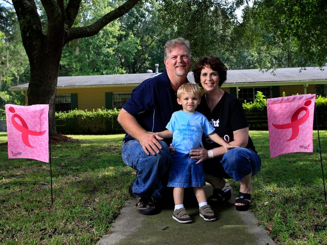 Cancer survivor Pam Clevenger is shown at home with her 22-month-old son, Collin Clevenger, and husband, Chris Clevenger, Tuesday, September 28, 2010 in Gainesville, Fla.