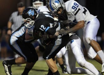 Nease's Matt Roth (left) is one of the county's top defenders. Bartram Trail defenders Dillon Varnadore (10) and Korey Harris (99) make a tackle during a Ponte Vedra game. Record file photos