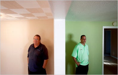 Richard Clark, left, with his agent, Kevin Corasio, is trying to buy a foreclosed home in Florida.