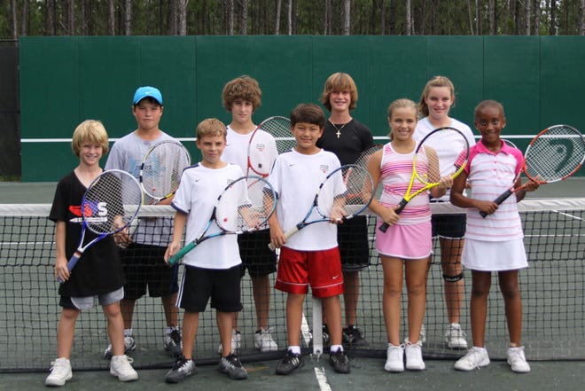 Julington Creek Plantation's U14 intermediate tennis team, which is comprised of players ranging in age from 8 to 13, had a very rewarding season. the team consisted of Will Rose (front row, left), Matthew Clark, Andrew Fitt, Camille Lastrapes and Imani Graham; Cole Bradley (back row, left), Alexander Celis, Reid Rose and Jordan Thorn.