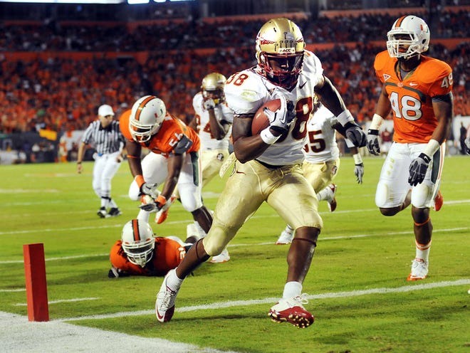 Florida State's Jermaine Thomas, a former First Coast High standout, scores a first-half touchdown against Miami on Saturday.