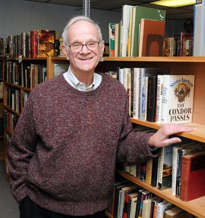 Ted Seager, 74, owner of Village Books in Medway is closing his used book store after 11 years.