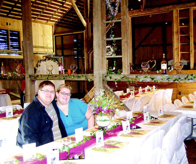 Katrina Olivier and Justin Ross got married Sunday and were the first to use the restored German bank barn at the Allison-Antrim Museum for a wedding reception.