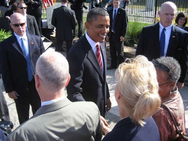 Teresa Jahn shakes hands with President Barack Obama.