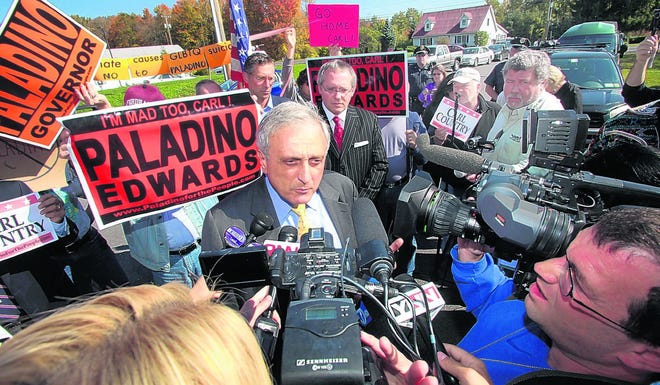 People protesting Republican gubernatorial candidate Carl Paladino's anti-gay remarks followed him during his campaign stops in Ulster County on Tuesday, heckling him during his speeches and getting into confrontations with his supporters.