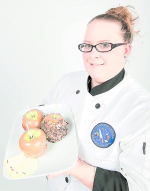 Victoria Perry recommends making caramel apples a family affair. By DARON DEAN, daron.dean@staugustine.com