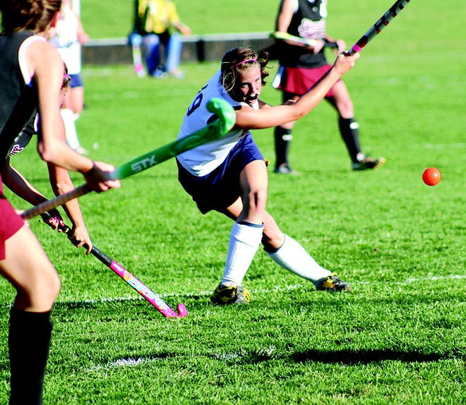 G-A's Sarah Gipe delivers a hard shot to the goal.