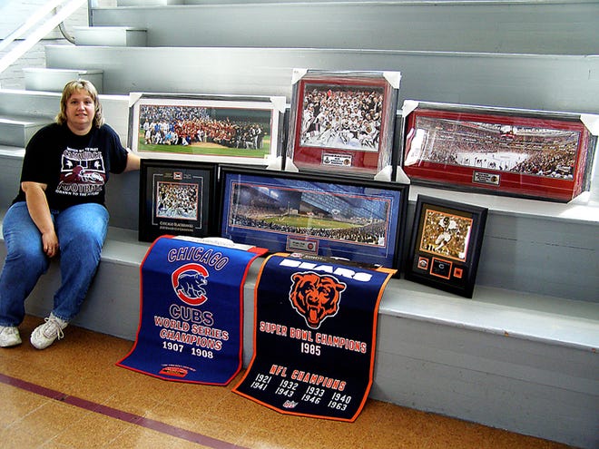 Tim Kane has been diagnosed with Stage 4 cancer. A benefit will be held Saturday, Oct. 16, at the Henry County Fairgrounds in Cambridge. Misty Wilson is pictured with some of the items for an auction.