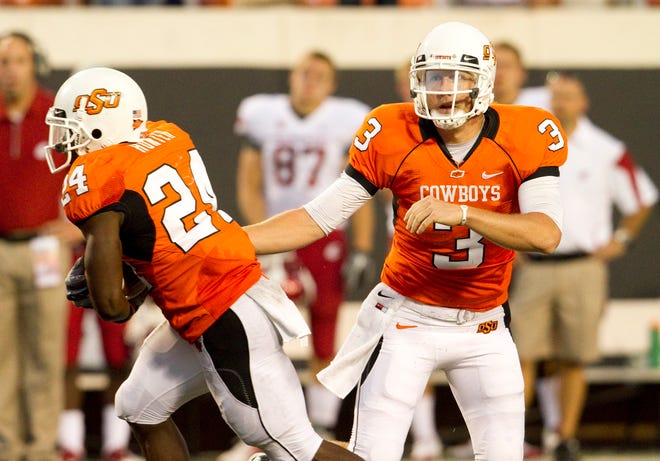 Oklahoma State running back Kendall Hunter, left, and quarterback Brandon Weeden give the Cowboys one of the nation's most productive offenses.