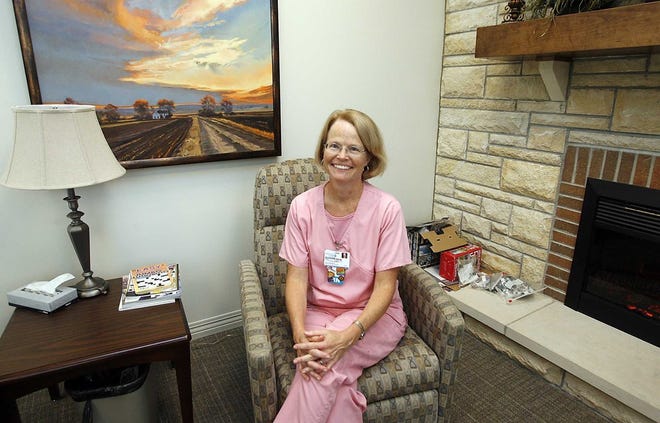 Susan Parry, oncology nurse at Cotton-O’Neil Cancer Center, says part of her job is assisting cancer patients through the treatment process. Sometimes, that means providing care for many years.