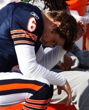 Chicago Bears quarterback Jay Cutler (6) sits on the bench in the second half of the Bears' 23-20 loss to the Seattle Seahawks in an NFL football game in Chicago, Sunday, Oct. 17, 2010.