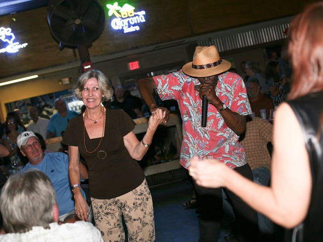 Festival goers kick up their heels to Willie “Real Deal” Green’s performance at Brick City Blues Festival at Midnight Rodeo in Ocala. (Courtesy of United Way of Marion County)