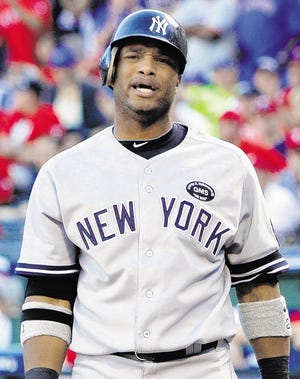 Yankees' Robinson Cano reacts to a strike call in the seventh inning against the Texas Rangers during Game 2 of baseball's American League Championship Series Saturday, Oct. 16, 2010, in Arlington, Texas. The Rangers won 7-2. AP Photo/Tony Gutierrez)