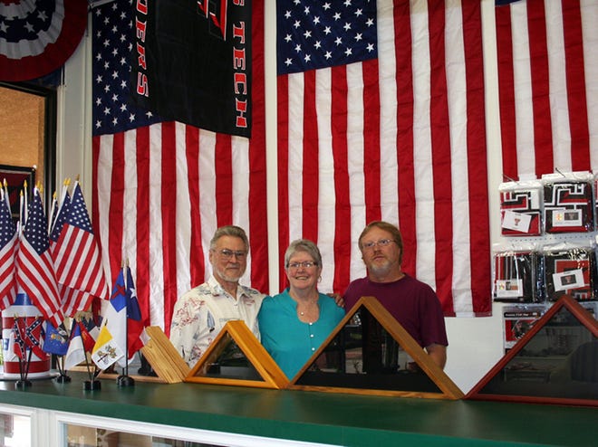 FAMILY-OWNED FOR 16 YEARS - Bill and Mary Hayes and son, Steve Hayes, owners of A-1 Flags Over Lubbock, invite you to come see their new location for flags of every size and description!