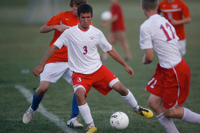 Pleasant Plains’ Dan Reiser dribbles the ball moments before scoring the only goal of the game Tuesday against Riverton in Williamsville.