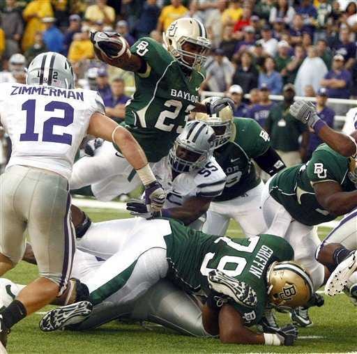 Baylor's Jay Finley (23) rushed for a school record 250 rushing yards, including one of his two TDs, in the track meet that was Baylor's 47-42 victory Saturday over Kansas State.