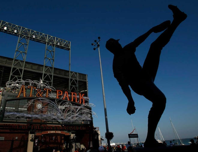 A statue of Juan Marichal stands outside AT&T Park in San Francisco. The Texas Rangers have never won in nine games at the Giants' current stadium, something they'll try to change when the World Series starts there on Wednesday.