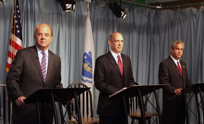 U.S. Rep. Jim McGovern, D-3rd, left, Patrick Barron, center, and Marty Lamb participate in a debate hosted by the Hopkinton Independent at HCAM TV Station on Monday evening.