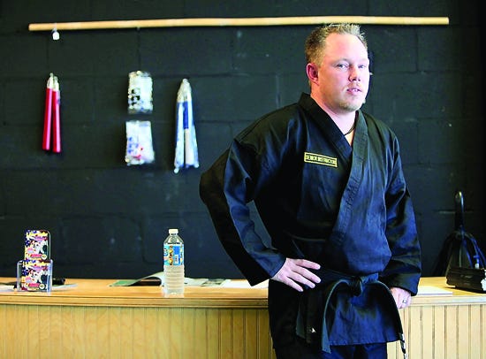 Richard Thibault stands in his Family Karate Academy on State Road 16 on Oct. 18. Photo by DARON DEAN, daron.dean@staugustine.com