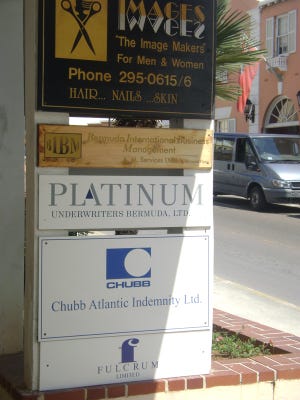 Appearances can be deceiving. Despite their importance to the Florida insurance market, reinsurance companies Platinum Underwriters and Chubb Atlantic share space on a Bermuda street front with a hair salon.