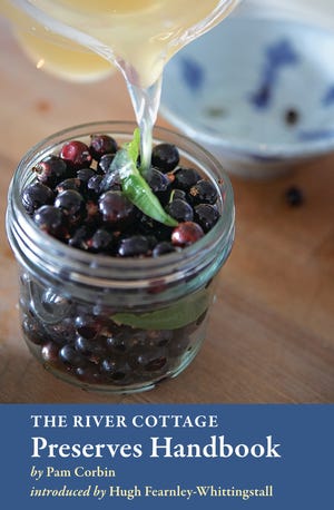 This book cover released by Ten Speed Press shows the cover of "The River Cottage Preserves Handbook," by Pam Corbin. Corbin's new book demystifies making your own preserves.